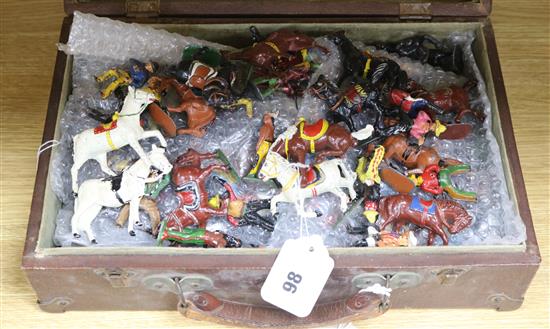 A quantity of Britains and other lead figures, mainly cowboys and Indians,